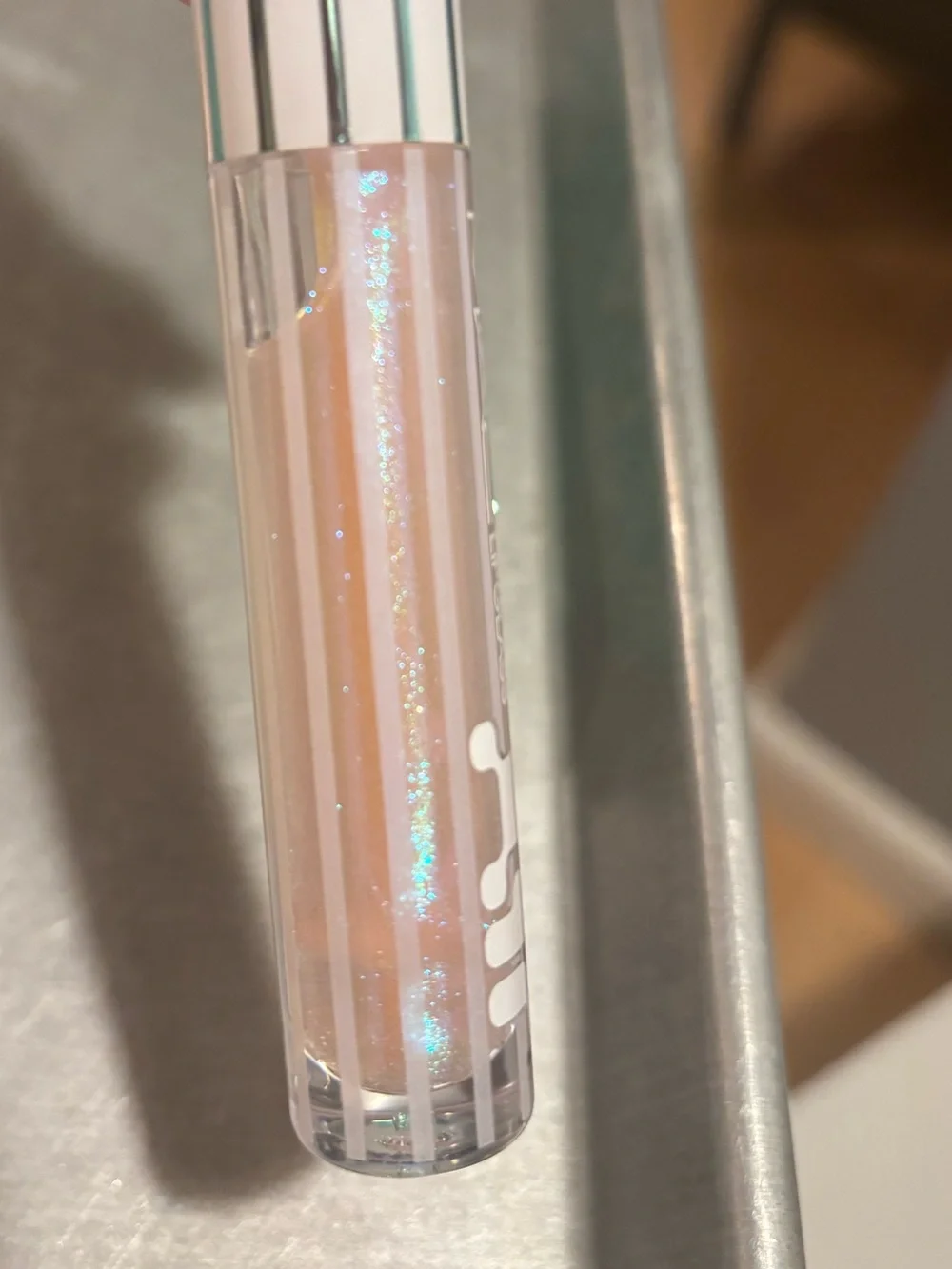 MAC Cosmetics Lipglass Gloss in shade Frozen a shimmery pink w blue reflect